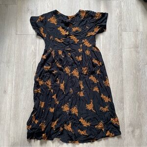 Black & orange checkered dress with pockets and button-up